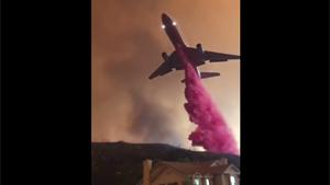 Firefighting Aircraft Drops Load