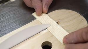 Cutting Wood With Paper
