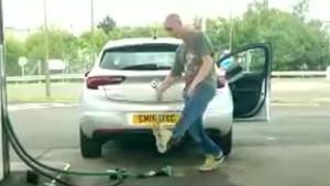 Drunk Guy Refueling Car
