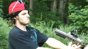 Retard Shoots Himself With Paintball Gun