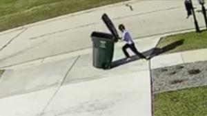 Kid Has Fight With Garbage Bin