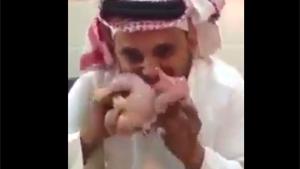 Arab Eating Raw Chicken