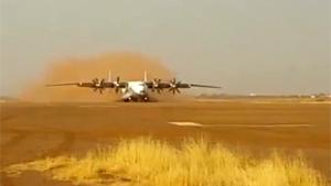 Antonov Landing On Dirt Runway