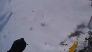 Skier Flying Of Huge Cliff