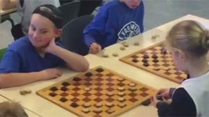 Girl Owns Boy At Checkers