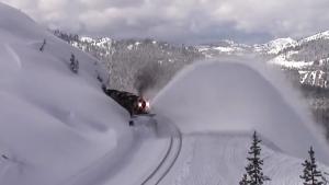 Snow Plow Train Coming Through