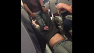 Passenger Dragged Off Plane