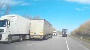 Truck Driver Takes Nap Behind The Wheel