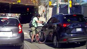 Angry Cyclist Smashing Mirror From Car