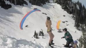 Parachute Skier Almost Hits Girl In Bikini