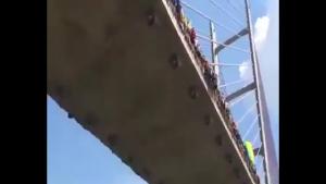 Daring Swing From Bridge