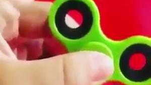Trying His New Fidget Spinner