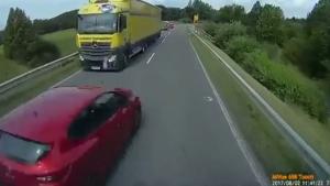 Close Call For Overtaking Motorist