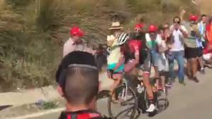 Policeman Pushes Supporter Under Motorcycle