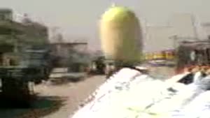 Iraqi woman carries huge melon on her head!