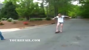 Girl fails at skating down hill