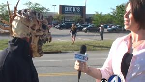 Masked Man Surprises TV Reporter