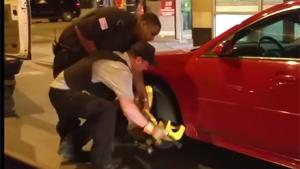 Security Guard Drives Off With Boot On Wheel