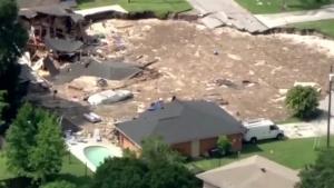 Sinkhole Makes Two Homes Disappear