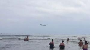MIG-17 Makes Low Pass On Beach